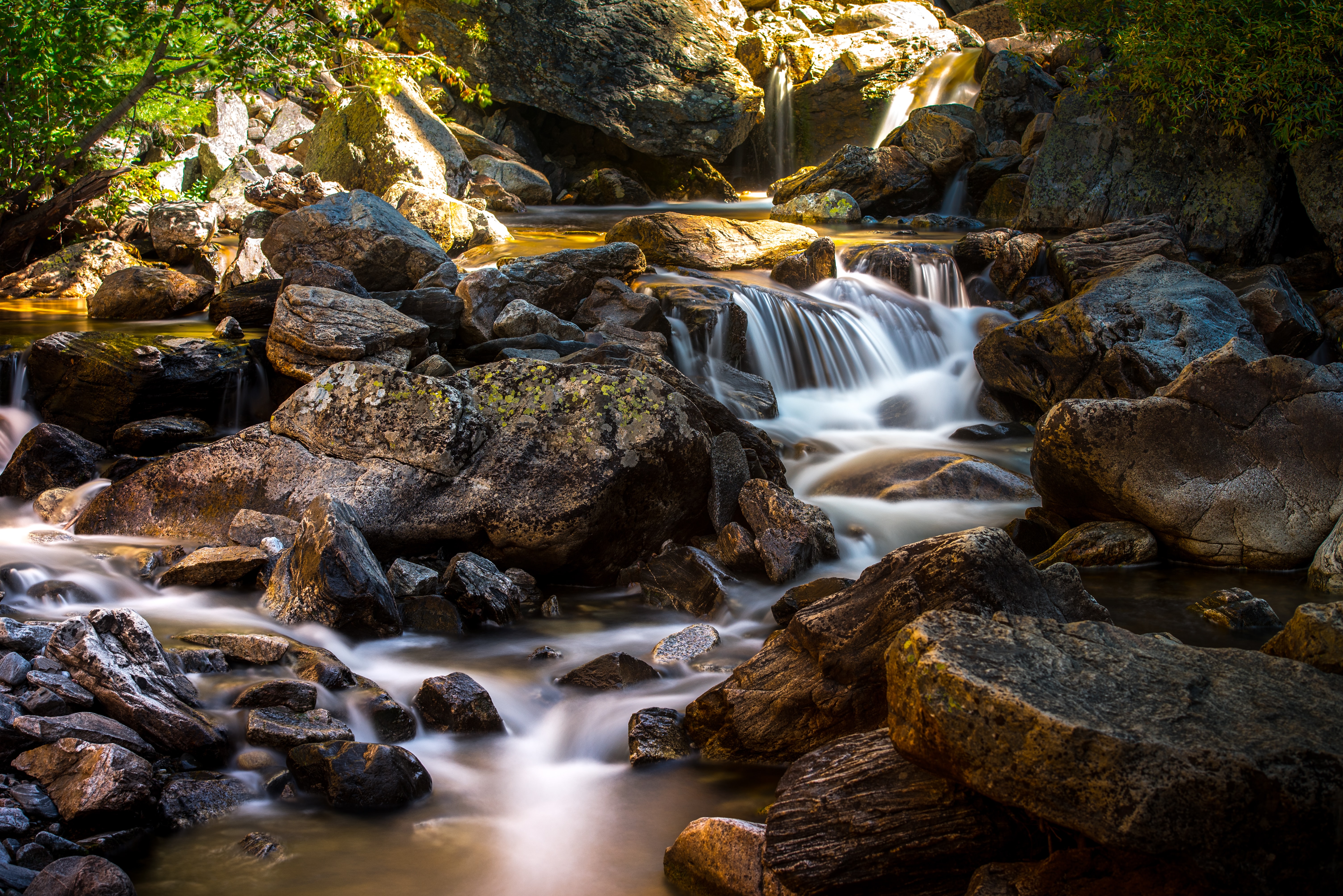 An image of a river flowing over rocks